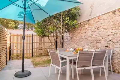 Image de Maisonette en pierre rénovée avec jardin à 100m de la plage - 5\/6 couchages et Wi-Fi