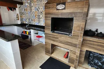 Image de Incrível casa com piscina e Wi-Fi em Mongaguá/Sp