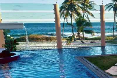 Image de Quiet beachfront 4/4 Ac - 8km from airport -Not village