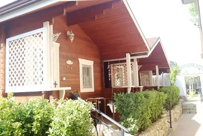 Image de 3 Romantic chalets with pool, 5 min from the beach!