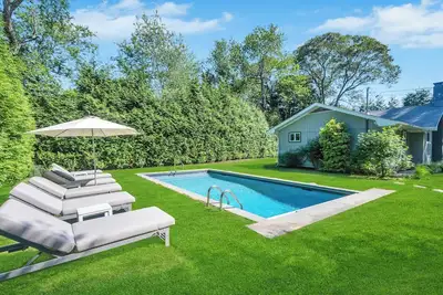 Image de Charming shingled home surrounded by beautiful landscaping and nature, . . .