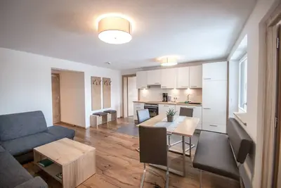 60 m² modern vacation apartment with balcony, free bathing lake, 100 m to the ski area