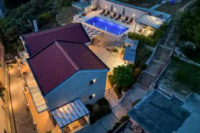 Image de Maison de vacances Gornje Tučepi pour 1 - 12 personnes avec 5 chambres à coucher - Ferme