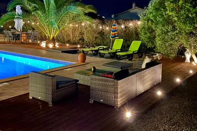 Image de Rustic Chic Villa with solar heated Pool five minutes from the beach!