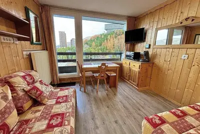Image de À 10m des pistes de ski, 5ème étage, balcon, télévision, casier à ski, 17m², Les Menuires