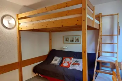 Image de 11er étage, vue sapins, télévision, 13m², Les Arcs