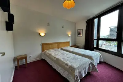 Image de À 10m des pistes de ski, 2ème étage, télévision, casier à ski, 36m², Les Menuires