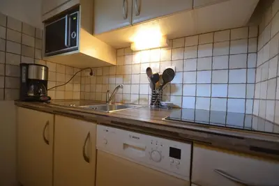 Image de À 10m des pistes de ski, 2ème étage, vue parking, balcon, télévision, casier à ski, 31m²