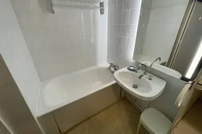 Image de À 10m des pistes de ski, 13ème étage, vue montagne, télévision, casier à ski, 25m², Les Menuires