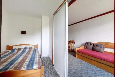 Image de 2ème étage, télévision, casier à ski, 24m², Les Menuires