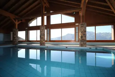 Image de À 100m des pistes de ski, Rez-de-chaussée, balcon, parking, télévision, casier à ski, 45m²