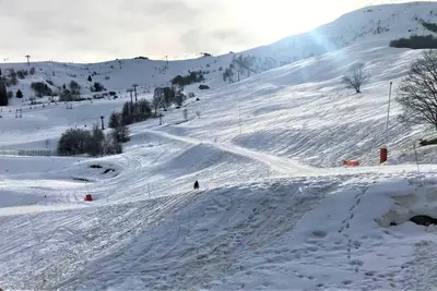 Image de À 100m des pistes de ski, 5ème étage, piscine, balcon, télévision, casier à ski, 65m², Le Corbier