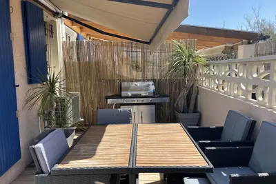 Image de Maison climatisée de 35 m2 avec 2 chambres et belle terrasse à 100 m de la plage