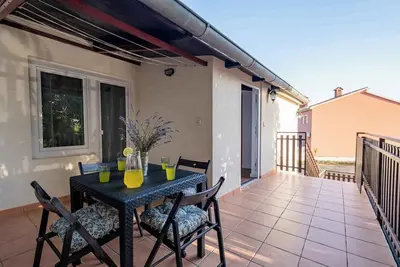 Image de Appartement de vacances avec air conditionné et barbecue