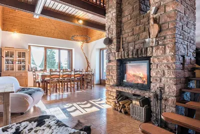 Image de Chalet The Lodge Monte Bondone près des pistes de ski avec vue sur les montagnes et sauna