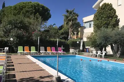Image de Appartement \"Villa Paola Bilo 4 Bis\", proche mer, avec piscine partagée et Wi-Fi.