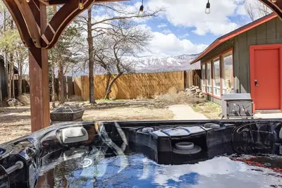 Image de family retreat with hot tub and game room