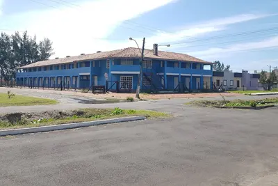 Image de Residencial Capão da Canoa, duplex apartment with garage.