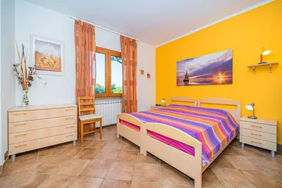 Image de Appartamento villa da 4 fino a 5 persone giardino