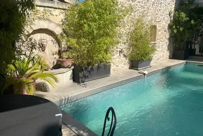 Image de Maison au cœur du village avec piscine