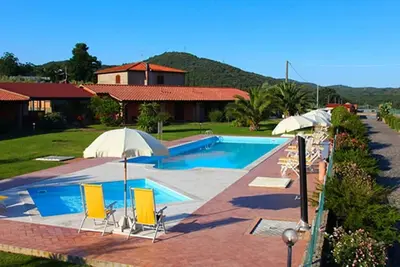 Image de Apartments with pool and garden a short distance from the beach.