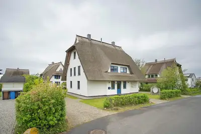 Image de Maison de vacances 'Seepferdchen' à proximité de la plage avec jardin, sauna et Wi-Fi