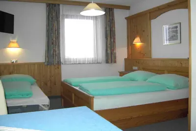 Image de Triple room - Pension Rieder