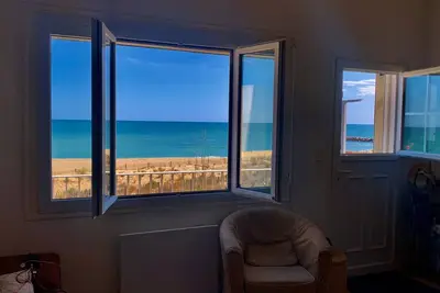 Image de Appartement sur la plage avec vue et balcon