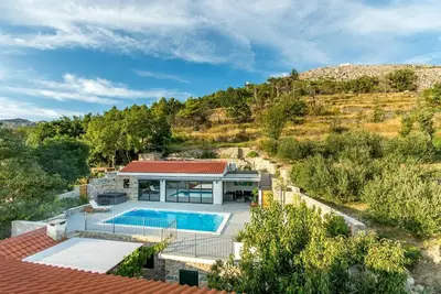 Image de Maison de vacances Donje Sitno pour 1 - 8 personnes avec 4 chambres à coucher - Maison jumelée