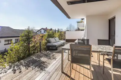 Image de Appartement 'Domizil auf der Höri' sur le lac de Constance avec vue partielle sur le lac