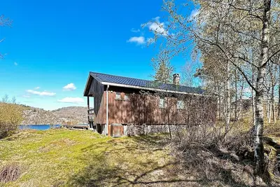Image de Maison de vacances pour 5 a Farsund-By Traum