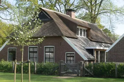 Image de Maison de vacances א Nijverdal avec jacuzzi