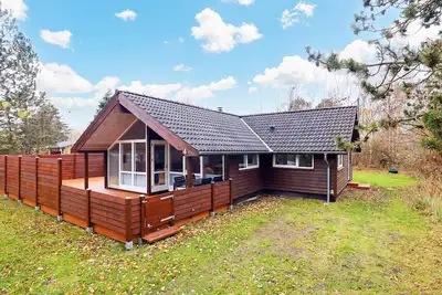 Image de Maison de vacances pour 8 a Rødby-By Traum