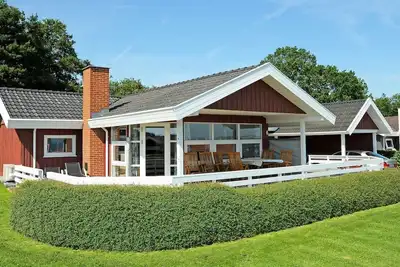 Image de Maison de vacances pour 8 a Sjølund-By Traum