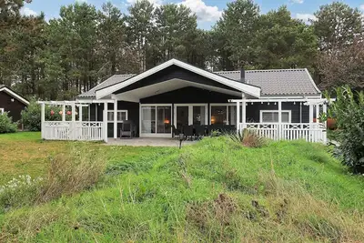 Image de Maison de vacances pour 7 a Rødby-By Traum