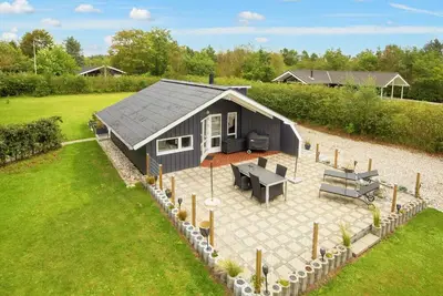 Image de Maison de vacances pour 4 a Oksbøl-By Traum