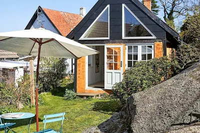 Image de Maison de vacances pour 2 a Svaneke-By Traum