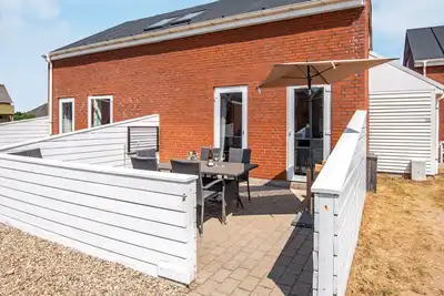Image de Maison de vacances pour 5 a Rømø-By Traum