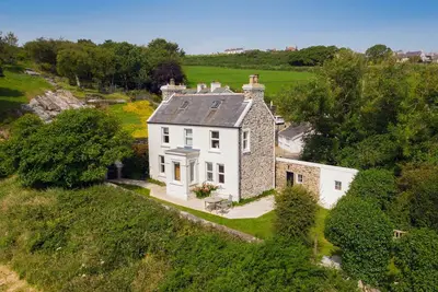 Image de Riverside cottage is situated in a wonderful location near Port St Mary, Isle of Man. Nestled in a p