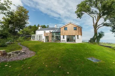Image de Thie Spooyt is a large family holiday home enjoying magnificent views across the north of the Isle o