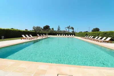 Image de Maison de vacances 'Casa Nero D Avola A Otranto' avec piscine partagée, Wi-Fi et climatisation