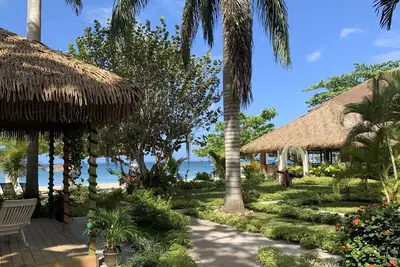 Relax in Jamaica - Enjoy 7 Miles of White Sand Beach! by RedAwning