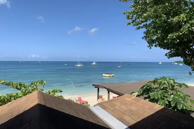 King Suite at Oceanview Resort in Jamaica - Enjoy 7 miles of White Sand Beach! by RedAwning