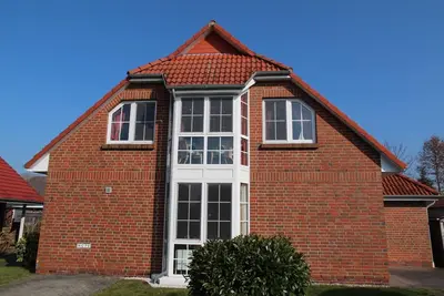 Image de Robbeninsel - Semi-detached house (85sqm) for 5 persons + dogs with terrace in