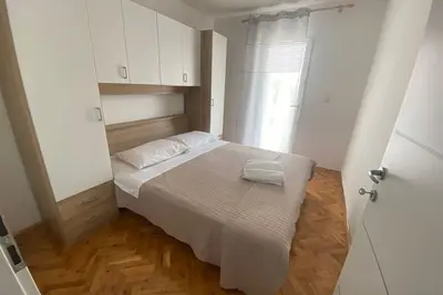 Apartments Roko- Two bedroom apartment with balcony and garden view (B4)