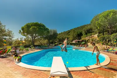 Image de Nouvelle gestion Maison de vacances Villaggio Colombo V3 avec jardin et piscine partagée