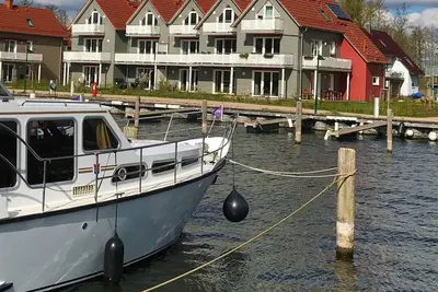 Image de Ferienwohnung am Yachthafen Optional mit Bootsliegeplatz im Haus 7 - Hafenapartment 8 im
