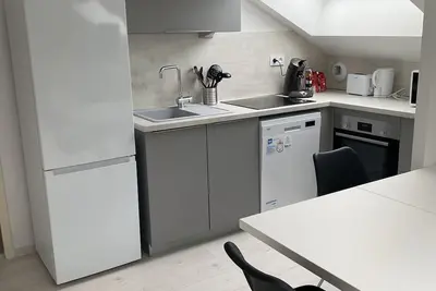 Image de Appartement lumineux et rénové au pieds de lac et montagne
