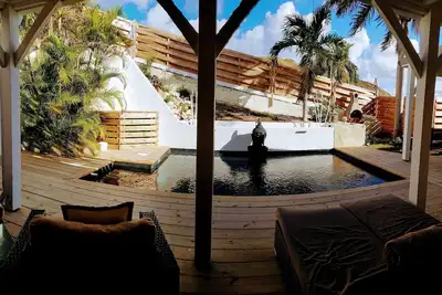 Image de Appartement cosy avec piscine et terrasse privatisées. Face à l'ilet Pinel