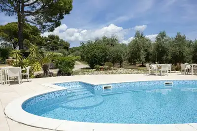 Image de Confortable appartement pour 6 personnes avec Wifi, piscine, Tv, patio, animaux admis et parking